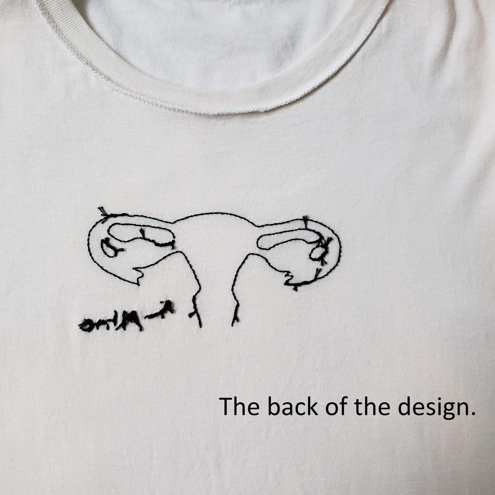 The back of the design. You can see the uterus is nice and tidy, and that "mine" looks much thicker because it is a different stitch.