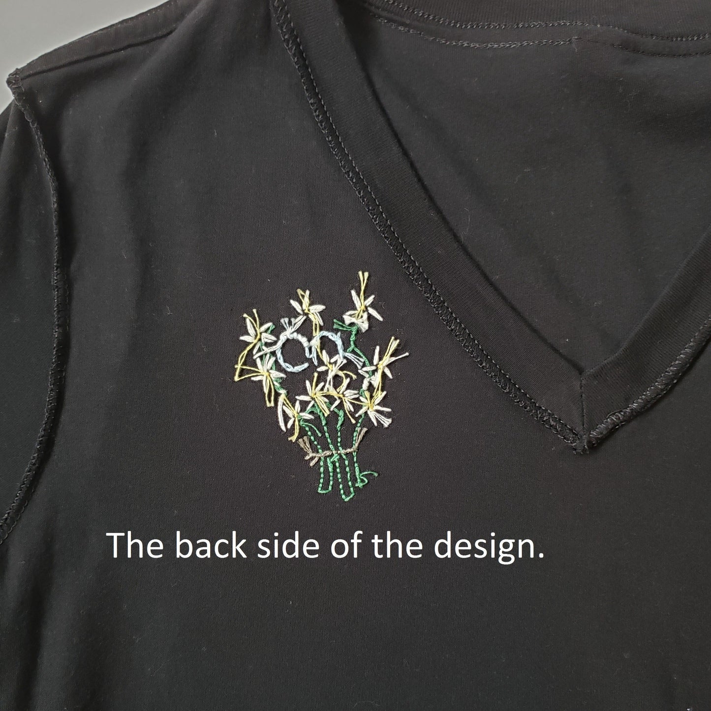 The back side of the design. You can see it looks tidy overall, but it's somewhat hard to discern what's what since the flowers do make a more abstract design from this side.
